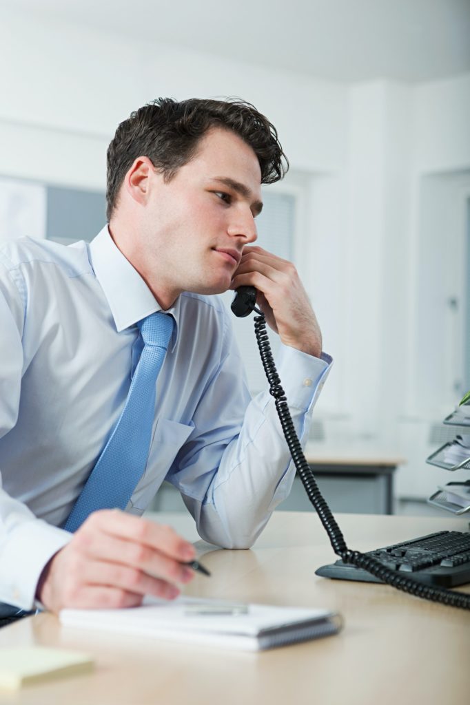 Office worker on telephone call